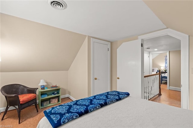 bedroom with vaulted ceiling