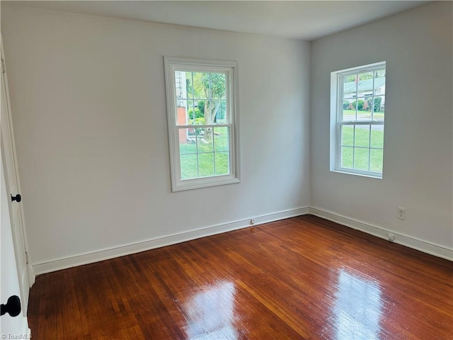 524 Ashburn St, High Point, NC 27260 - spare room featuring baseboards and wood finished floors