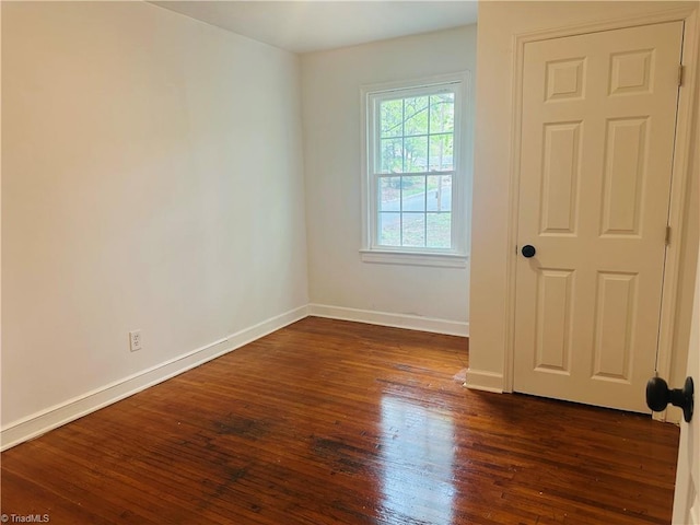 524 Ashburn St, High Point, NC 27260 - spare room featuring baseboards and dark wood finished floors