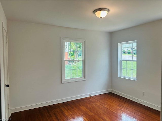 524 Ashburn St, High Point, NC 27260 - spare room featuring baseboards and dark wood finished floors