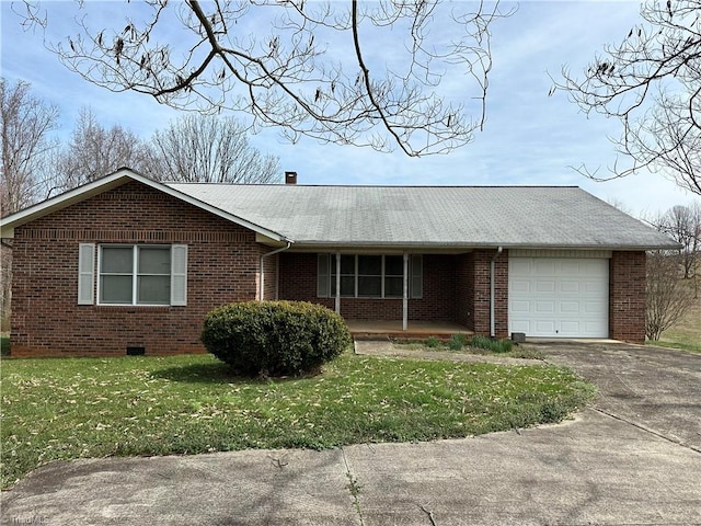 single story home with a front yard and a garage