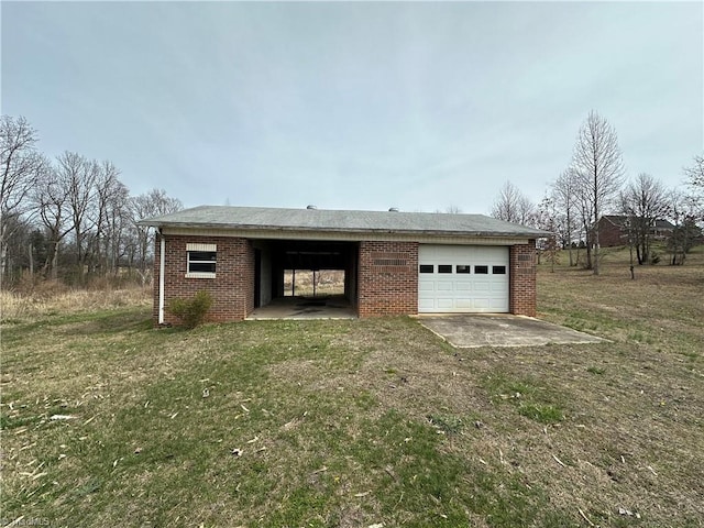 garage with a lawn