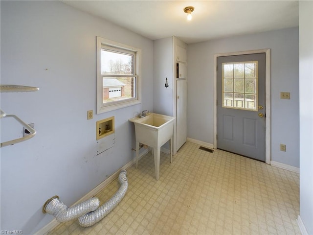 entryway with light tile flooring