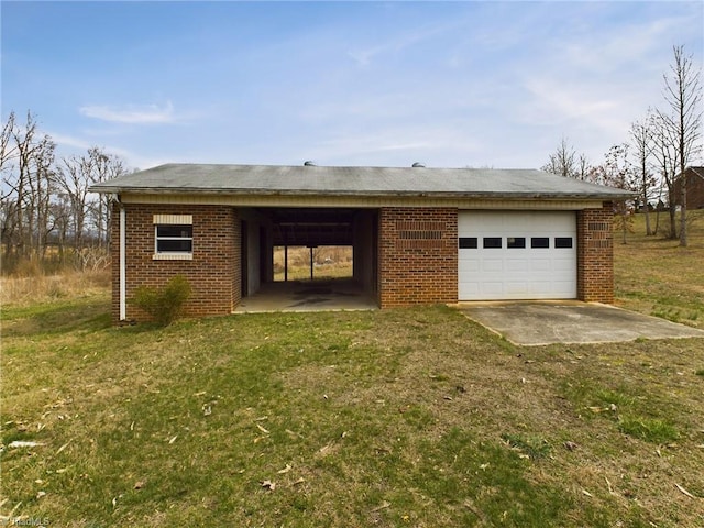 garage with a yard