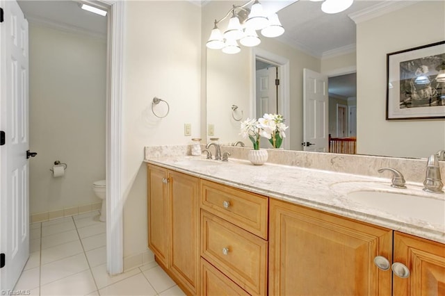 bathroom with an inviting chandelier, tile patterned floors, toilet, vanity, and ornamental molding