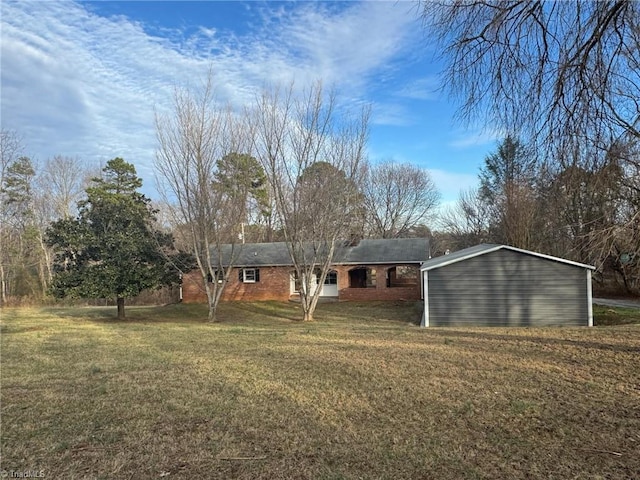 exterior space featuring a front lawn and brick siding