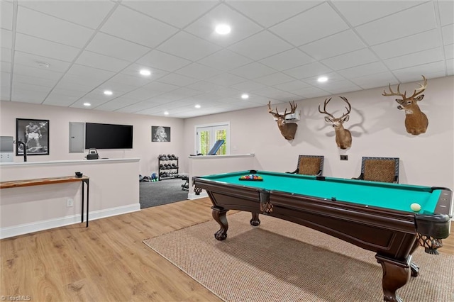 game room with wood finished floors, pool table, a drop ceiling, recessed lighting, and baseboards
