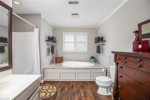 full bathroom with vanity, crown molding, hardwood / wood-style flooring, toilet, and independent shower and bath