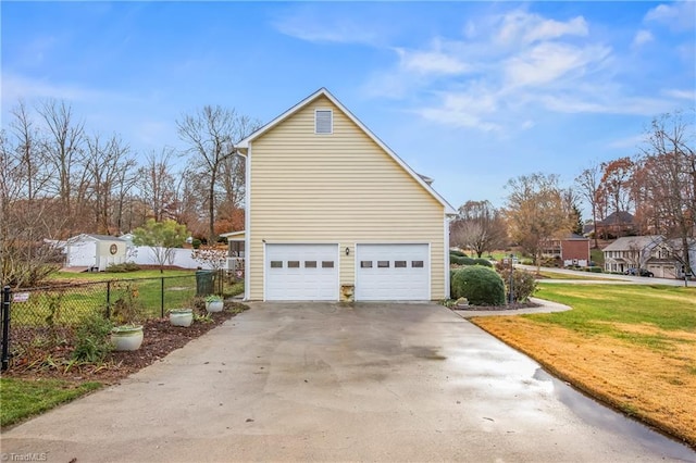 view of side of property with a lawn