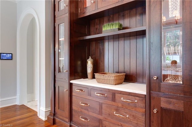 mudroom with dark hardwood / wood-style flooring