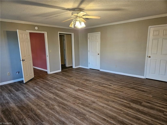 unfurnished bedroom with a textured ceiling, ceiling fan, crown molding, and dark wood-type flooring