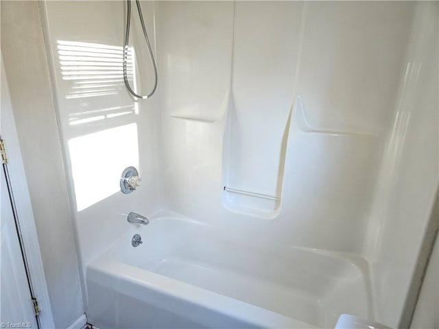 bathroom featuring bathing tub / shower combination