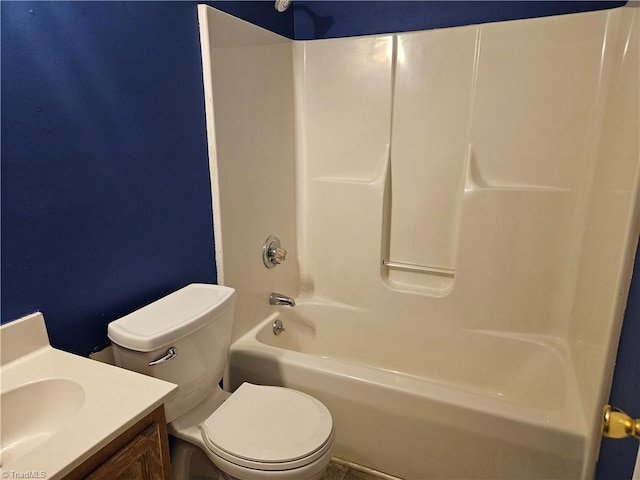 full bathroom featuring vanity, tub / shower combination, and toilet