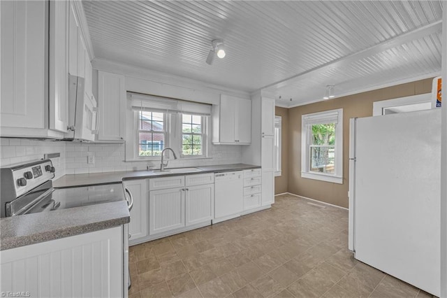 307 S Key St, Pilot Mountain, NC 27041 - kitchen with white appliances, a sink, plenty of natural light, tasteful backsplash, and crown molding