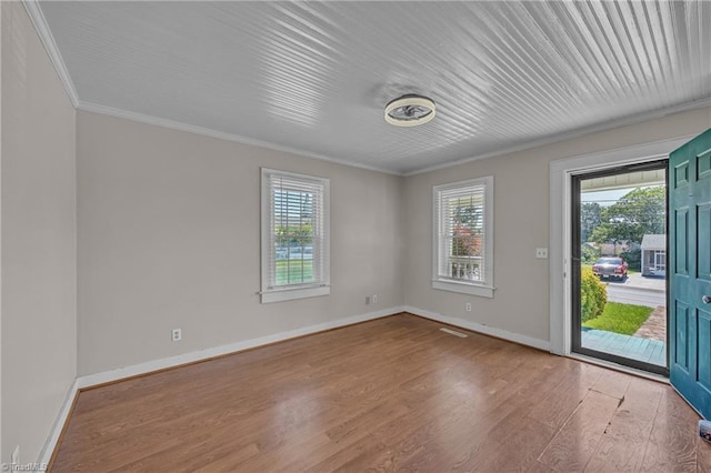 307 S Key St, Pilot Mountain, NC 27041 - spare room featuring ornamental molding, wood finished floors, and baseboards