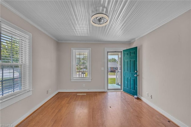 307 S Key St, Pilot Mountain, NC 27041 - foyer with wood finished floors, crown molding, and baseboards