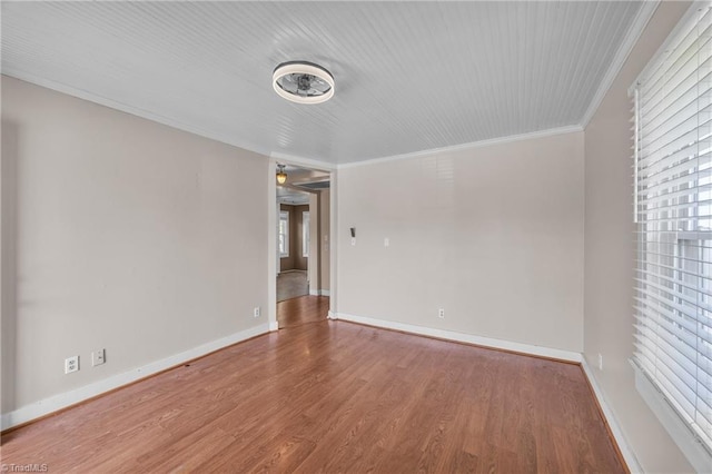 307 S Key St, Pilot Mountain, NC 27041 - empty room featuring wood finished floors, baseboards, and ornamental molding