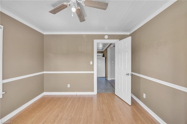 307 S Key St, Pilot Mountain, NC 27041 - empty room featuring ceiling fan, wood finished floors, ornamental molding, and baseboards