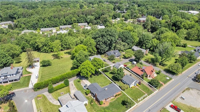 307 S Key St, Pilot Mountain, NC 27041 - aerial view of property's location with property parcel outlined and a heavily wooded area