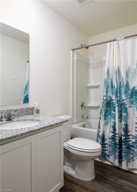 full bath featuring shower / bath combination with curtain, vanity, toilet, and wood finished floors