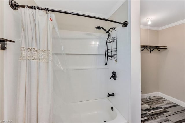 full bath featuring shower / tub combo, wood finished floors, crown molding, and baseboards