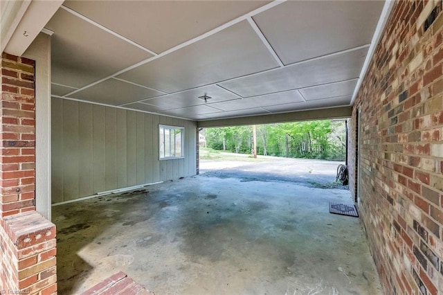 garage with a carport