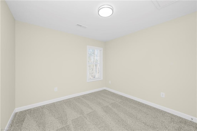 spare room featuring carpet flooring