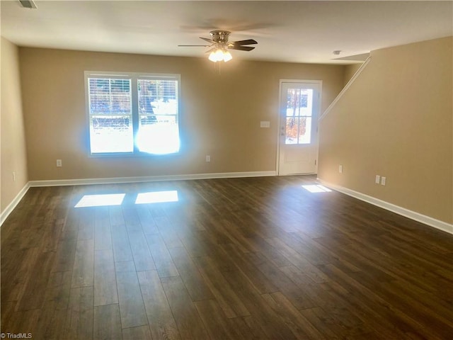 unfurnished room featuring ceiling fan and dark hardwood / wood-style floors