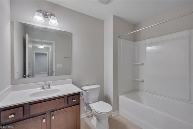 full bathroom featuring vanity, bathtub / shower combination, toilet, and tile patterned flooring