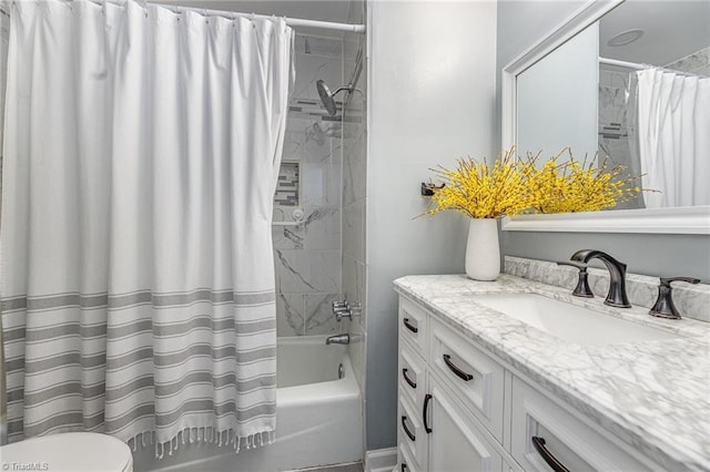 bathroom with toilet, vanity, and shower / bath combination with curtain