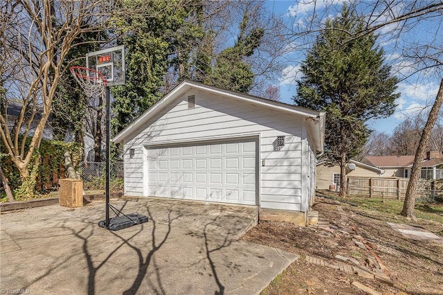 detached garage with fence