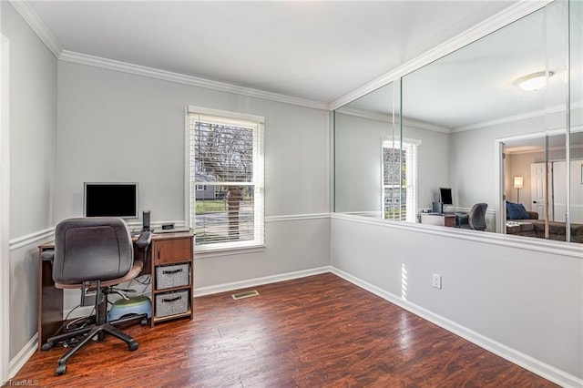 office with visible vents, crown molding, baseboards, and wood finished floors