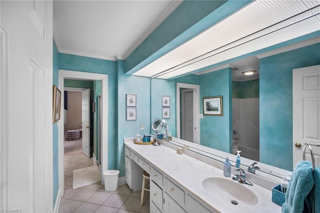 bathroom featuring tile patterned flooring, vanity, shower / bathtub combination, and crown molding