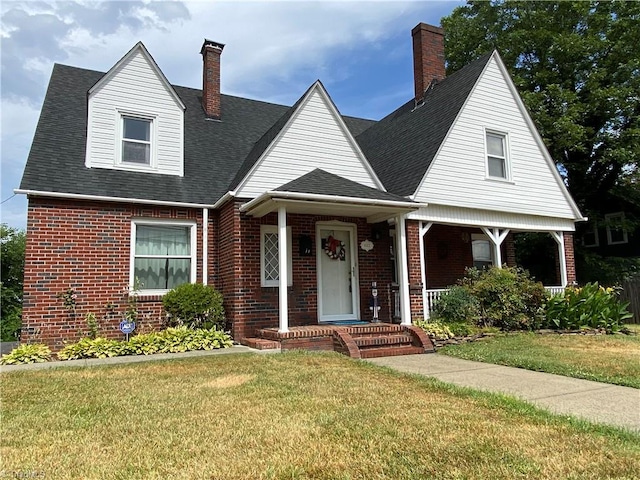 view of front of house featuring a porch and a front yard