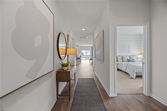 hallway featuring hardwood / wood-style floors