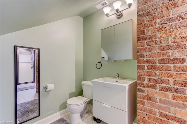 bathroom featuring visible vents, toilet, tile patterned flooring, baseboards, and vanity