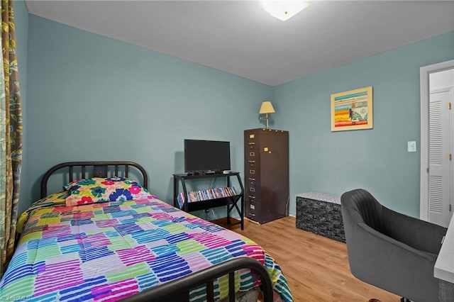 bedroom featuring hardwood / wood-style floors