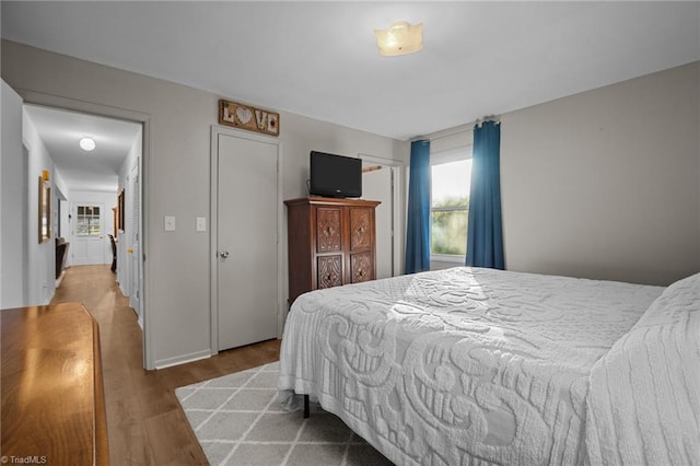 bedroom featuring light hardwood / wood-style floors