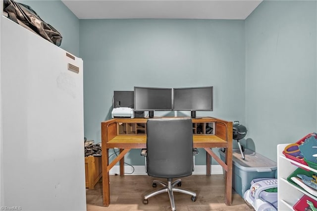 office space featuring hardwood / wood-style flooring