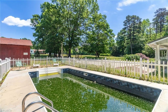 view of pool featuring a fenced backyard