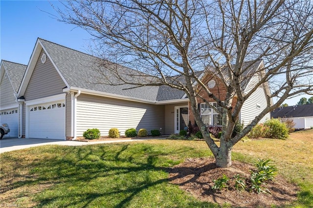 single story home with a front lawn and a garage