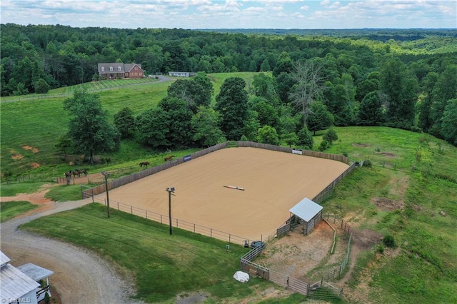 birds eye view of property featuring a rural view