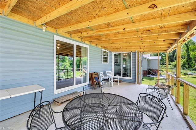 view of patio with outdoor dining area