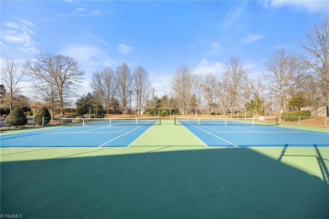 view of sport court with basketball hoop