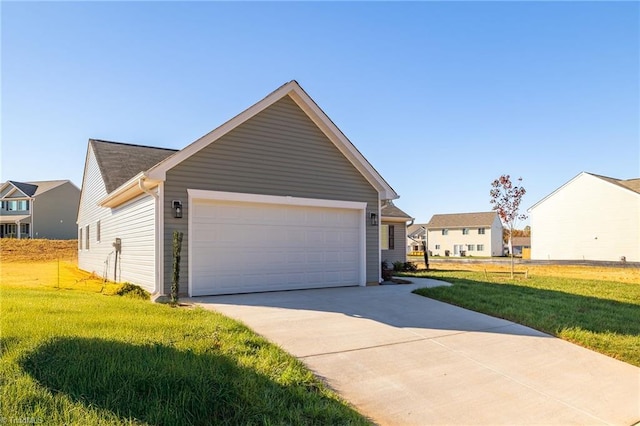 exterior space featuring driveway and a yard