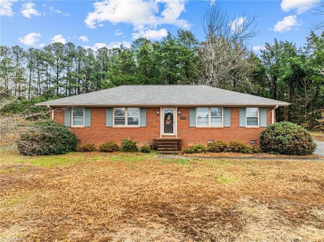 ranch-style house with a front yard