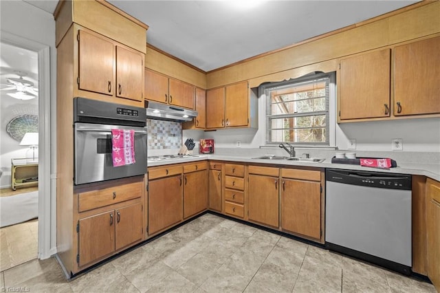 kitchen with ceiling fan, sink, and appliances with stainless steel finishes