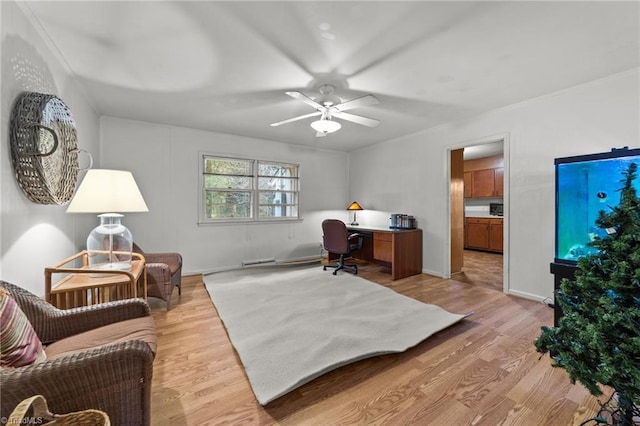 office with ceiling fan and light wood-type flooring