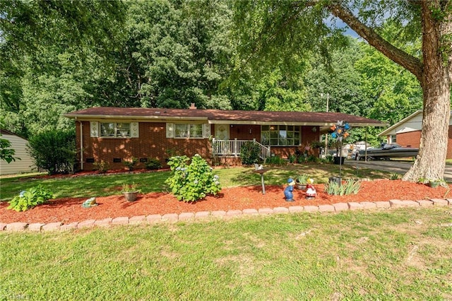 2003 Random Dr, Greensboro, NC 27407 - ranch-style home with a porch, a front lawn, and brick siding