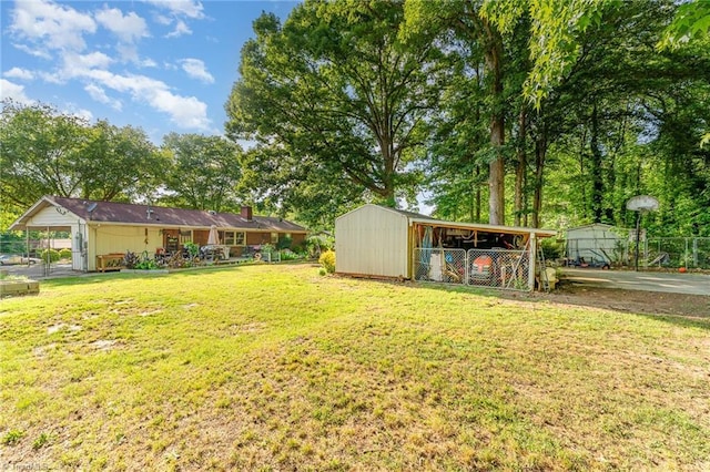 2003 Random Dr, Greensboro, NC 27407 - view of yard with an outdoor structure